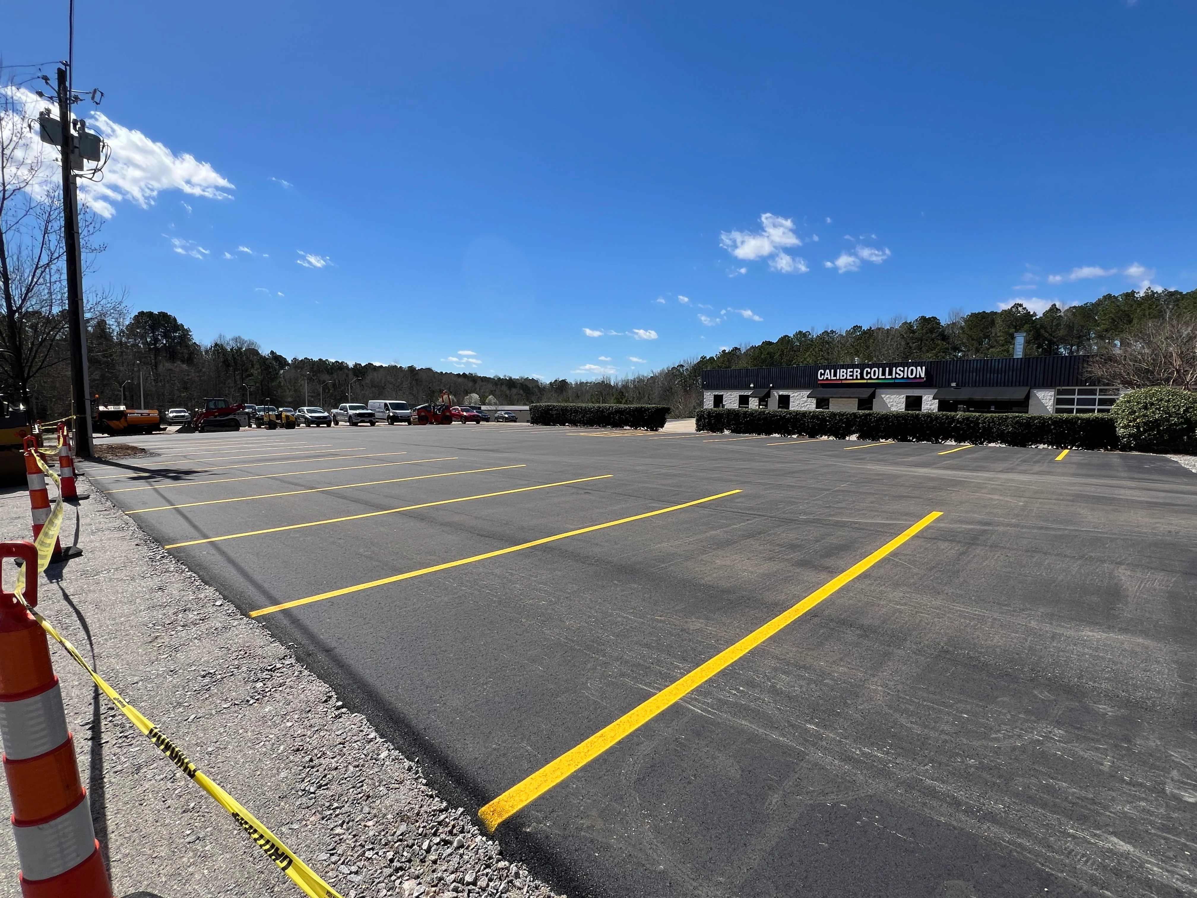 Commercial parking lot with fresh line striping and well-maintained asphalt surface